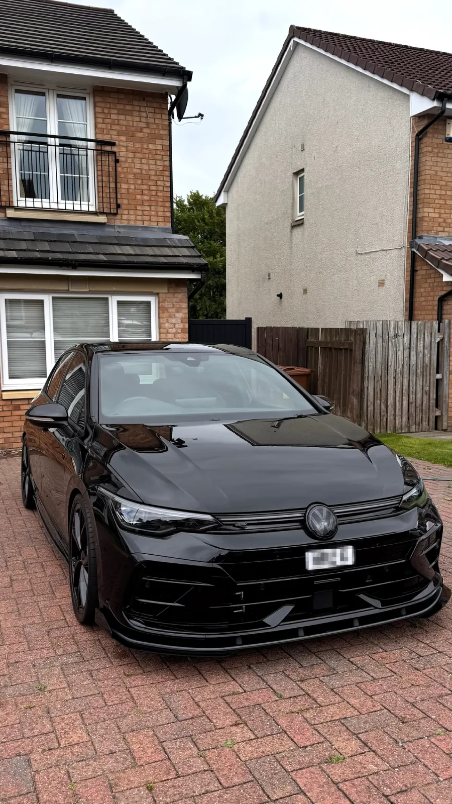 The same Volkswagen Golf R with a glossy, ceramic-sealed finish after The Detail Club Finish